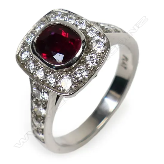 A platinum ruby and diamond cluster ring,