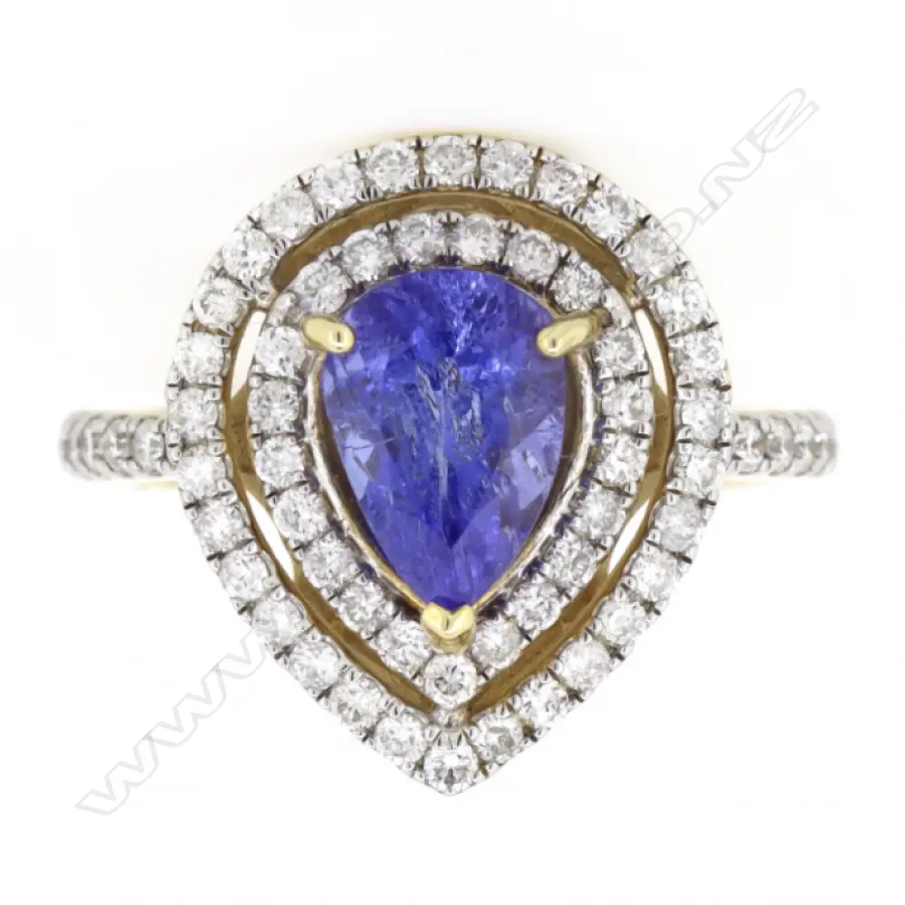 A 14ct gold tanzanite and diamond double halo ring, Image 1++