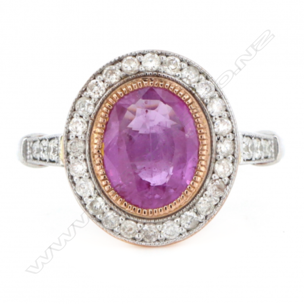 A 14ct white and rose gold pink sapphire and diamond halo ring, Image 1++