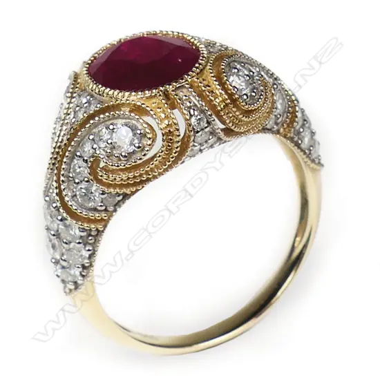 A 14ct gold ruby and diamond cluster statement ring,