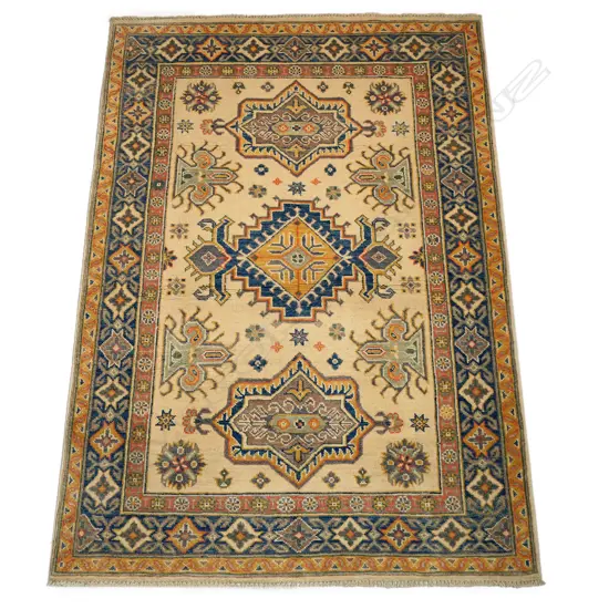 A hand-knotted Kazak rug,
