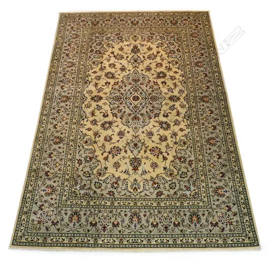 A fine hand-knotted Kashan carpet,