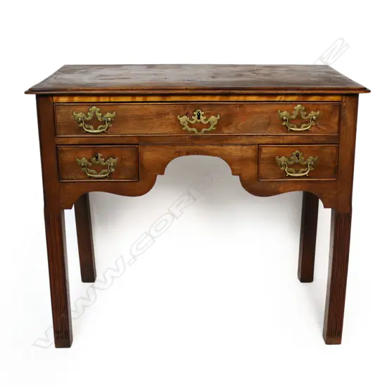 A George II and later walnut lowboy,