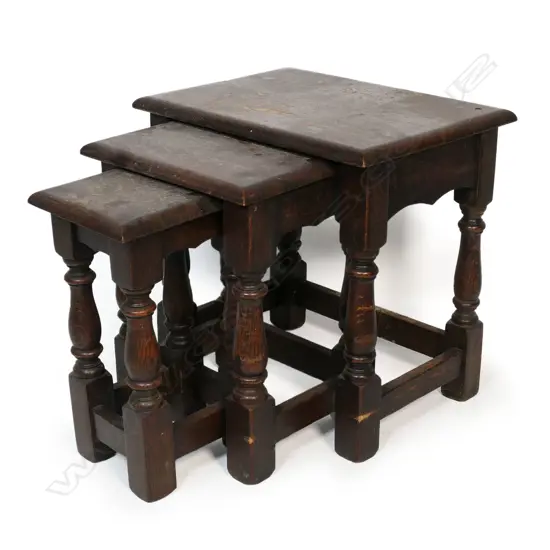 A set of three early / mid 20thC Georgian country style nesting tables,