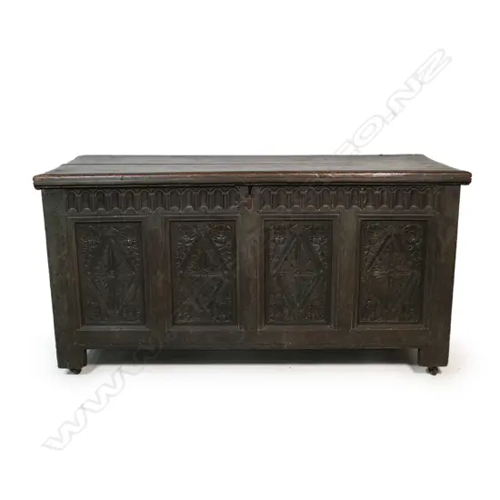 A large George III oak coffer,
