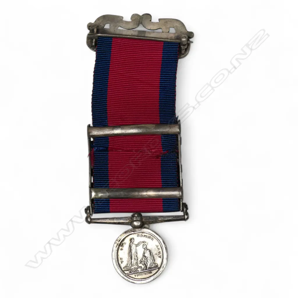 An unusual cased six bar miniature Military General Service medal with elaborate scroll brooch suspension, Image 1++