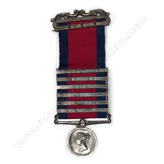 An unusual cased six bar miniature Military General Service medal with elaborate scroll brooch suspension,