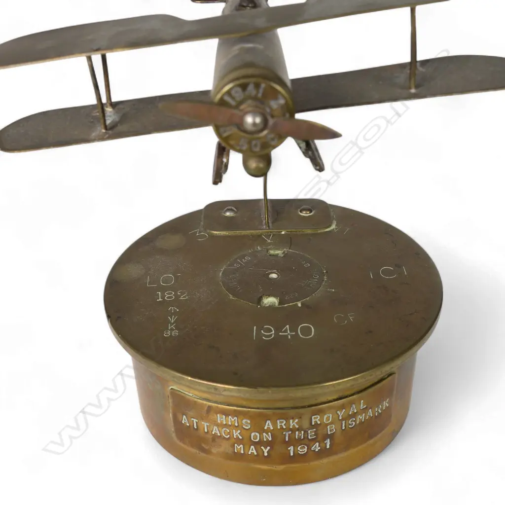 An old brass trench art bi-plane on large shell base, Image 1++