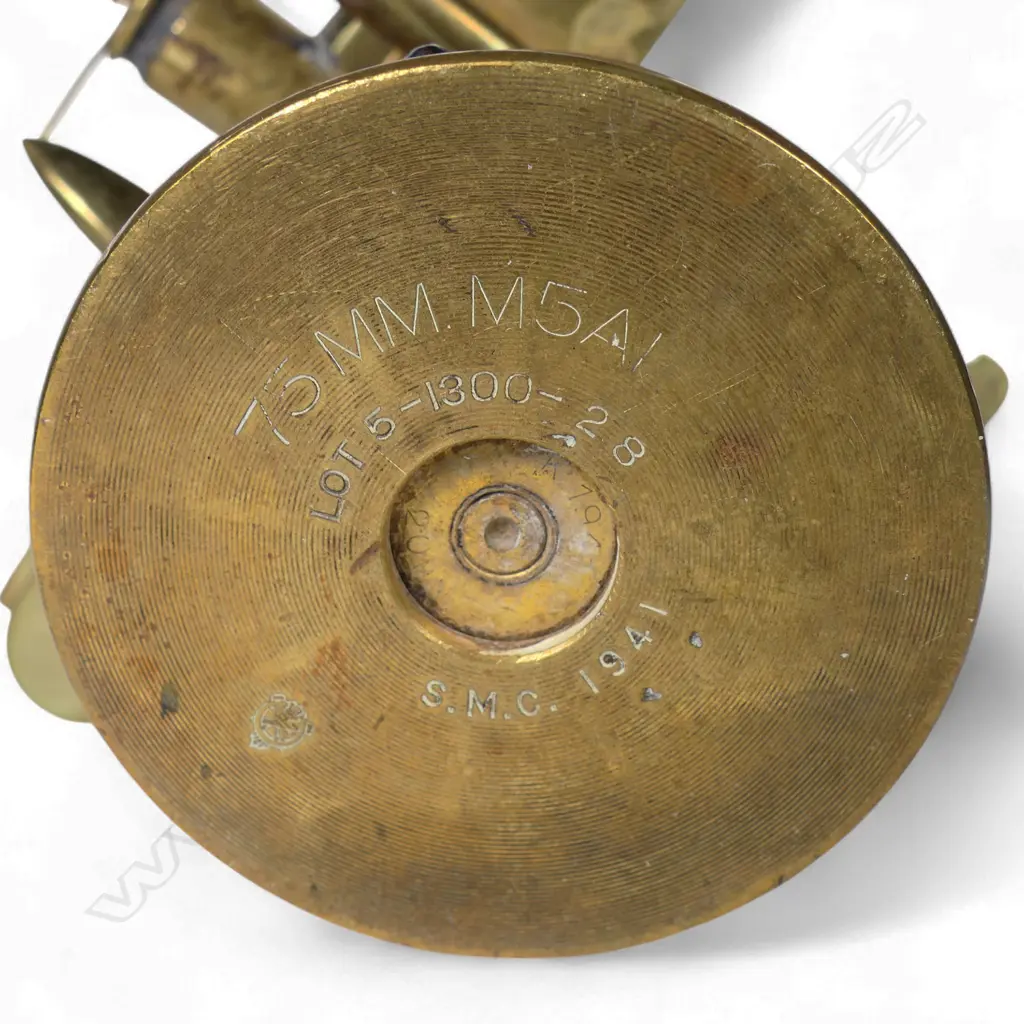 An old brass trench art float bi-plane on large shell cartridge end base, Image 1++