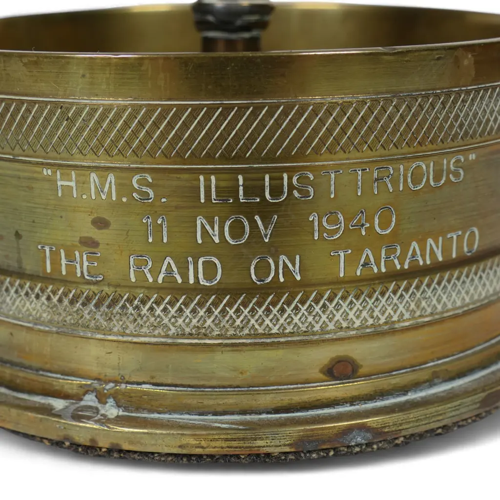 An old brass trench art float bi-plane on large shell cartridge end base, Image 1++