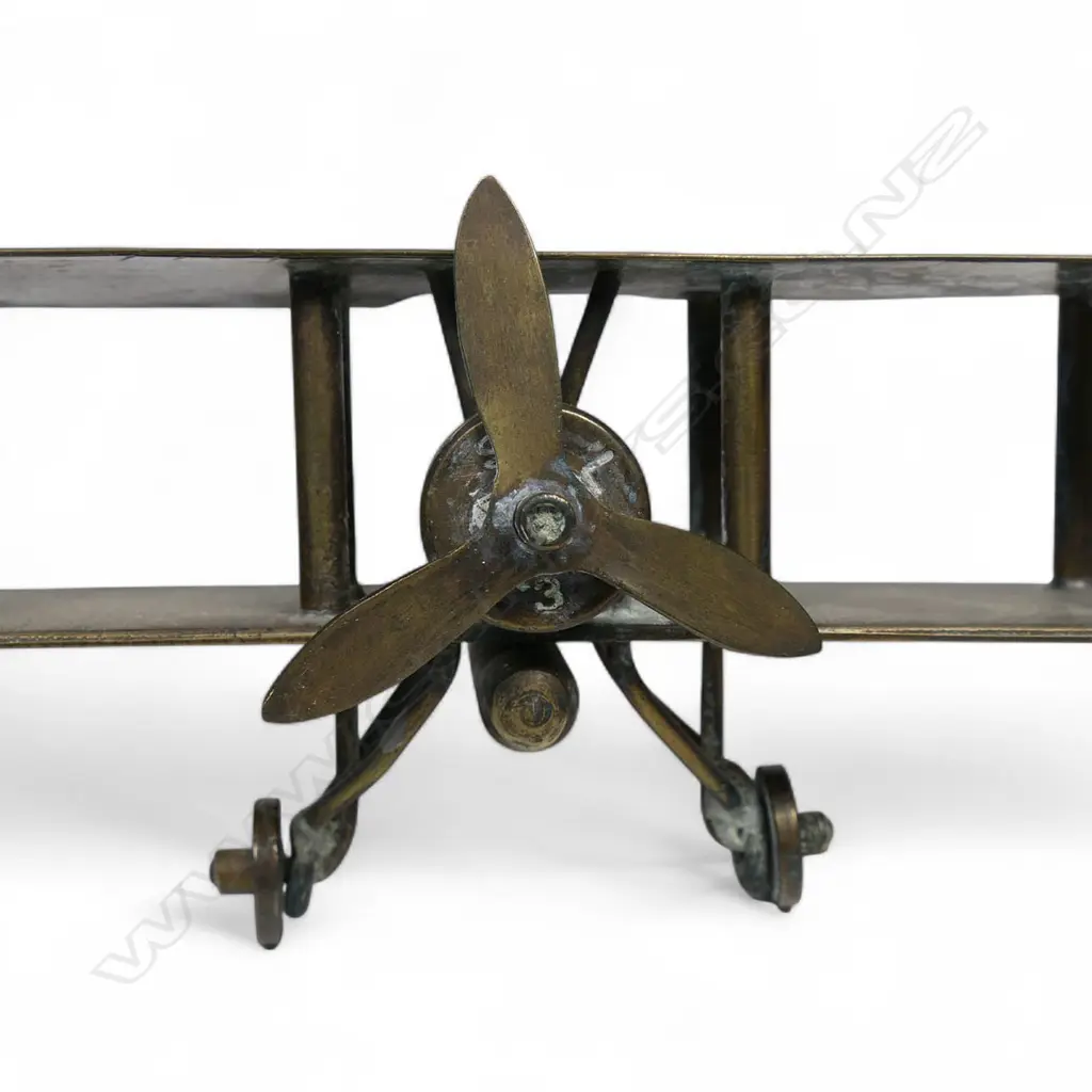 An old brass trench art bi-plane, Image 1++