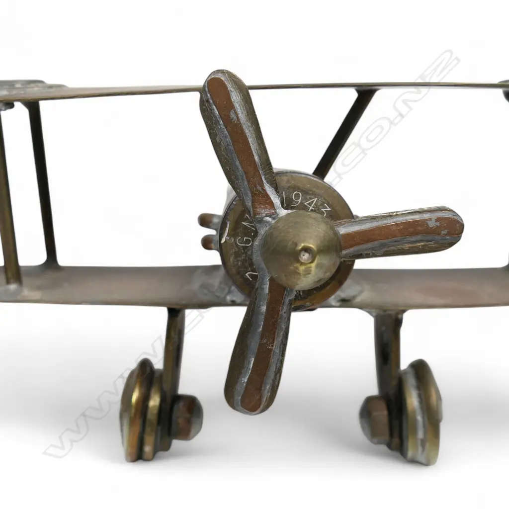 An old brass trench art bi-plane, Image 1++