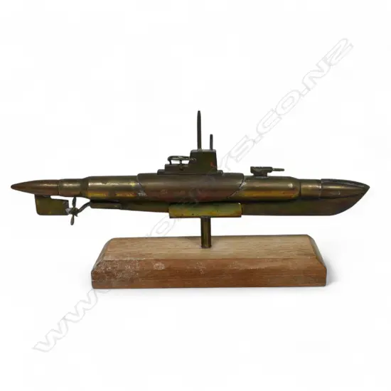 An old brass and copper trench art submarine,