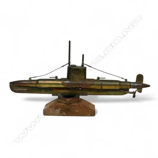 An old brass and copper trench art submarine,