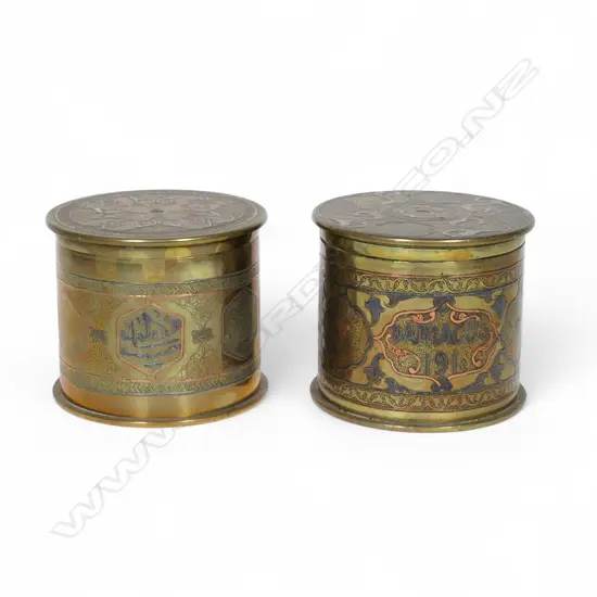Two WW1 trench art brass large shell case Persian decorated lidded canisters,