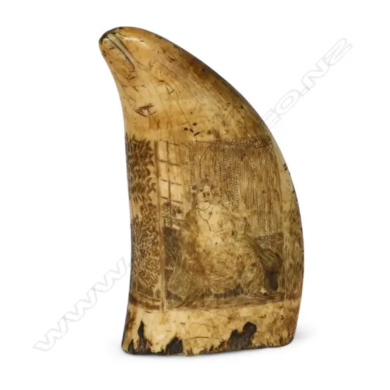 A 19thC sailor's scrimshawed whale's tooth,