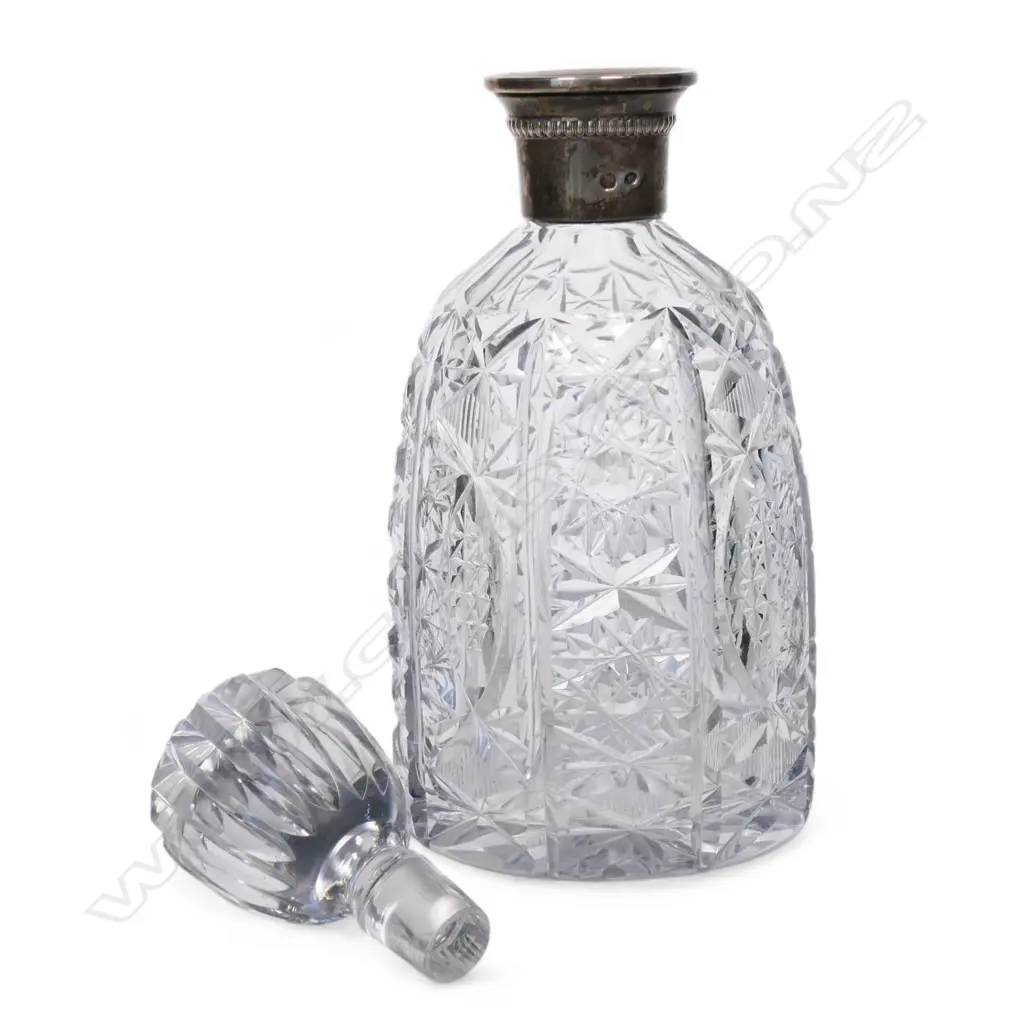 A crystal and silver decanter Image 1++