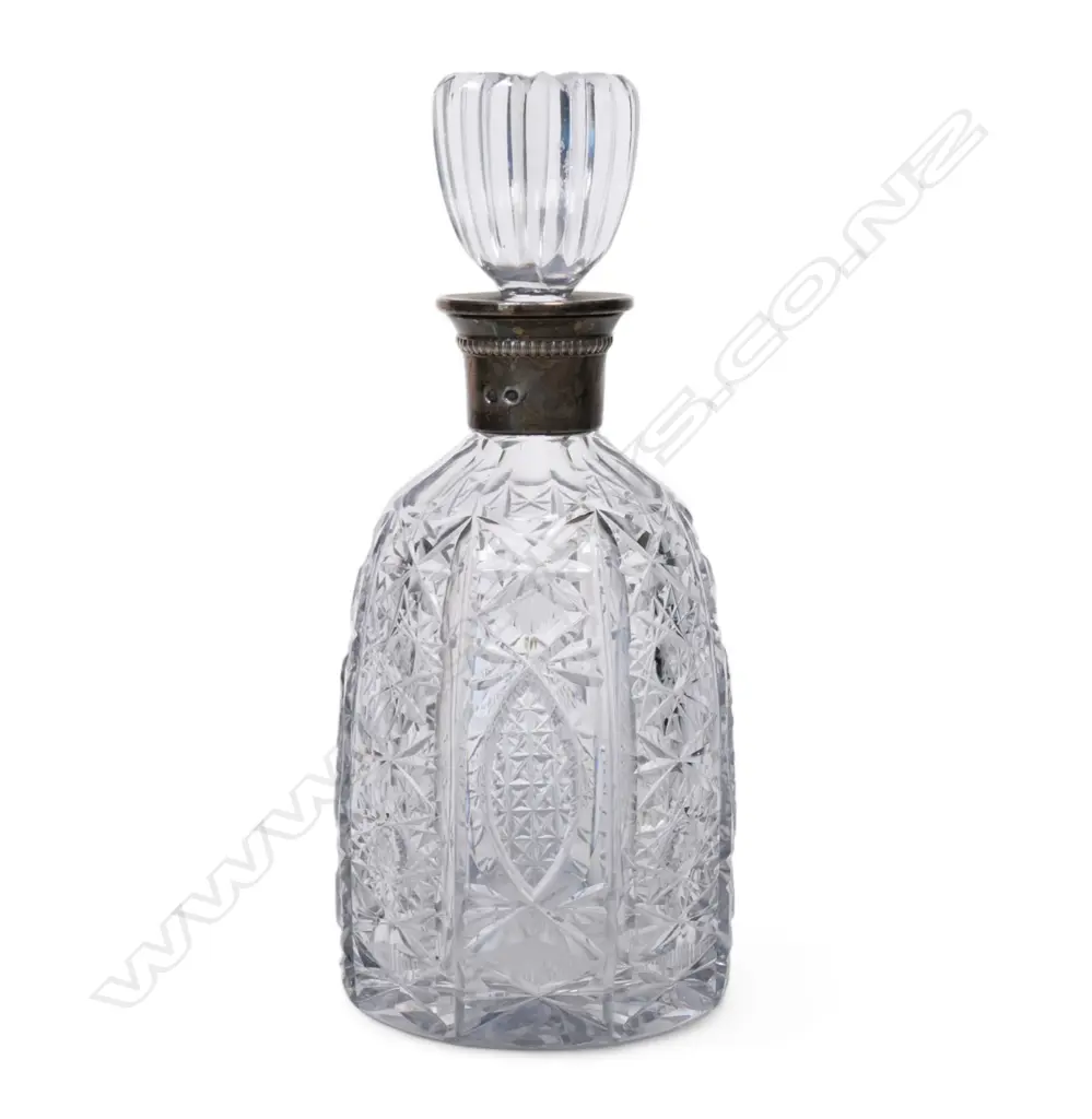 A crystal and silver decanter Image 1++