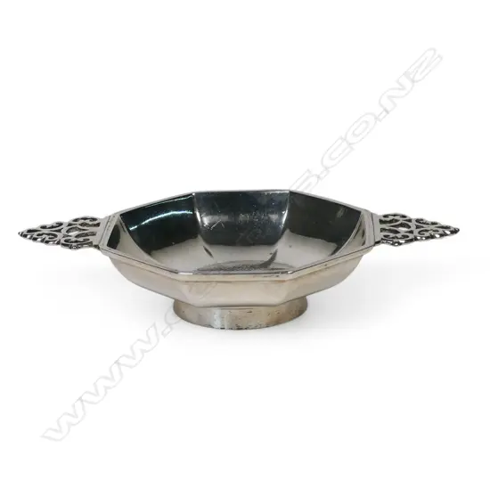 A heavy silver octagonal quaich,