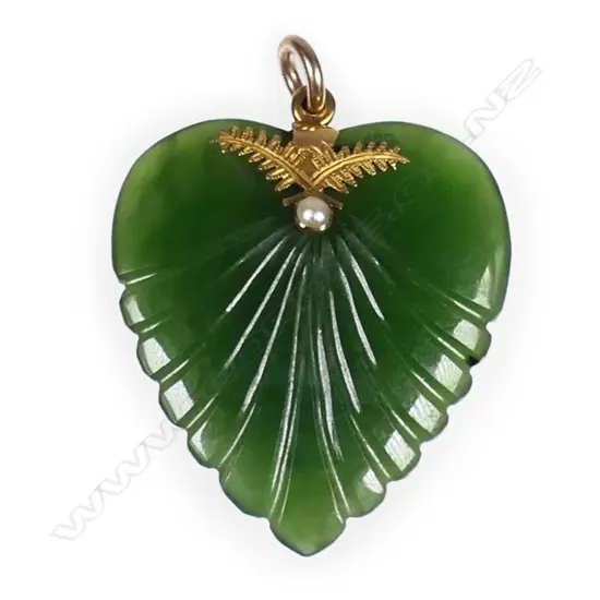 A c.1900 pounamu and 9ct gold mounted heart pendant,