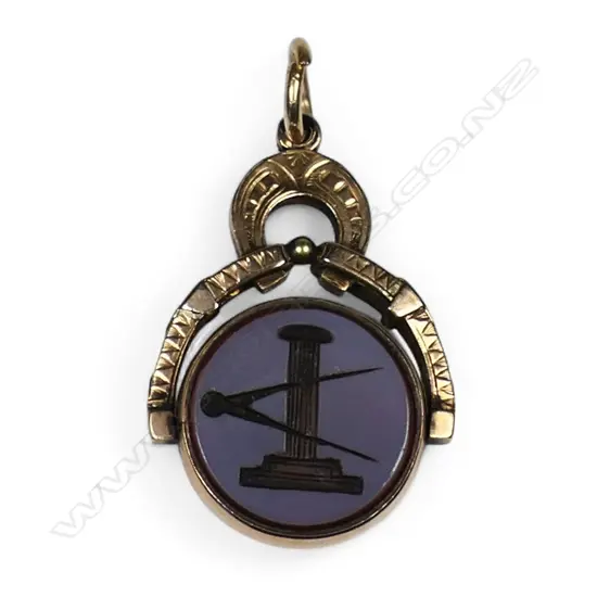 A c.1900 9ct gold and chalcedony Masonic fob spinner,