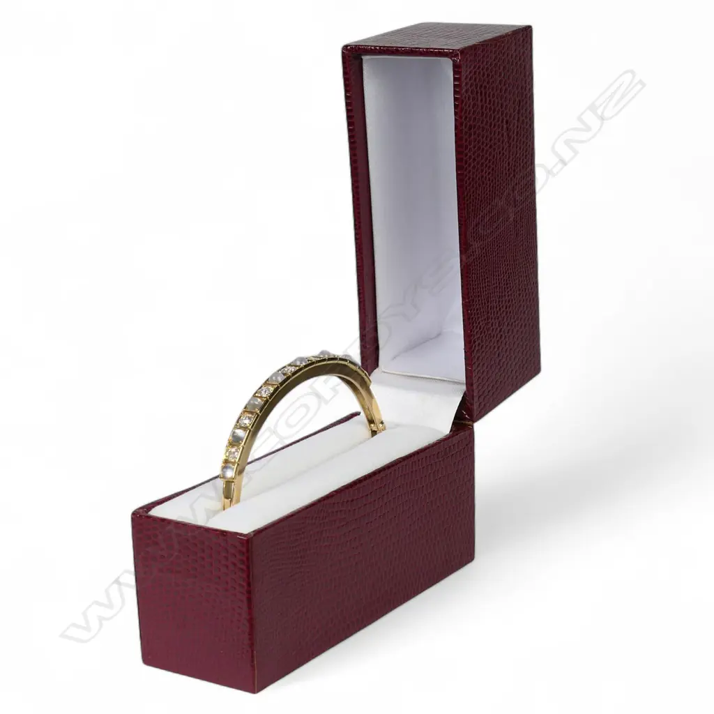 A 15ct rose gold moonstone and diamond hinged bangle, Image 1++