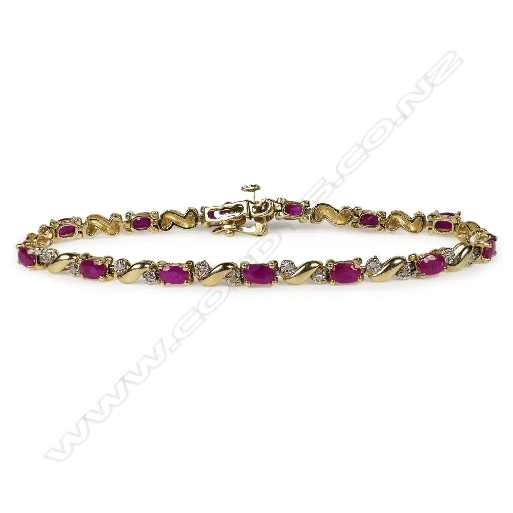 A 14ct gold diamond and ruby bracelet, Image 1++