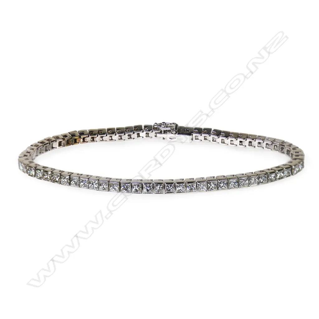 A 9ct. white gold and diamond tennis bracelet, Image 1++