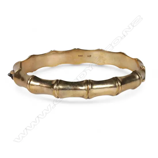 A 9ct rose gold vintage bamboo style hinged bangle,