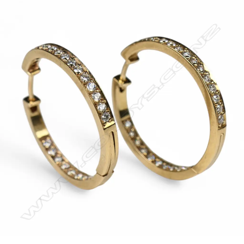 A pair of 18ct gold and diamond hoop earrings, Image 1++