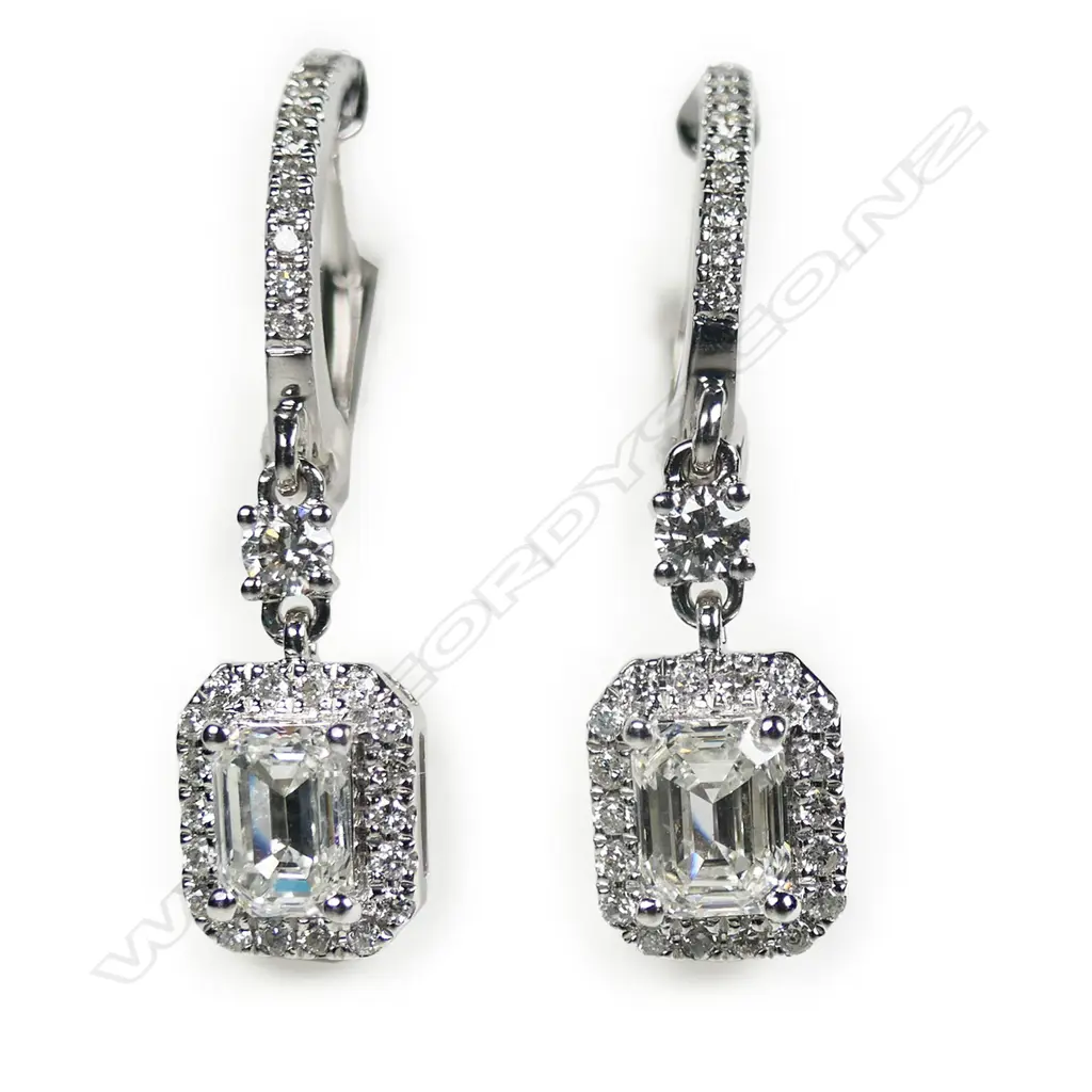 A pair of 18ct white gold and diamond earrings, Image 1++