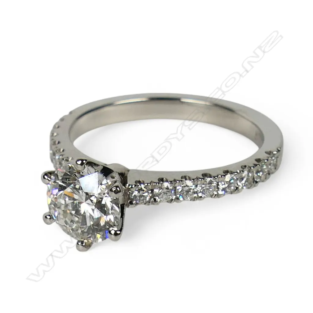 A platinum and diamond solitaire ring, Image 1++