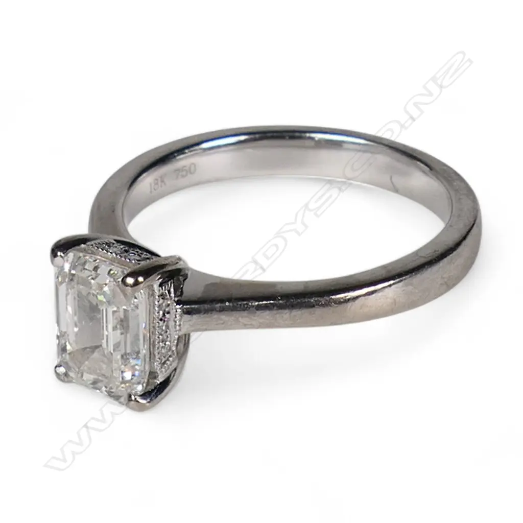 An 18ct white gold and diamond solitaire ring, Image 1++