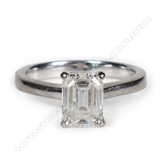 An 18ct white gold and diamond solitaire ring,