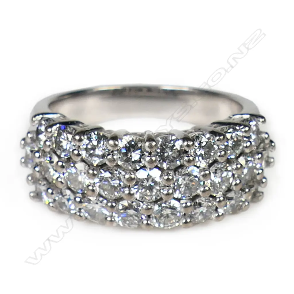 An 18ct white gold and diamond dress ring, Image 1++