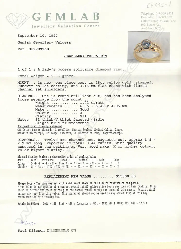 An 18ct gold and diamond solitaire ring, Image 1++