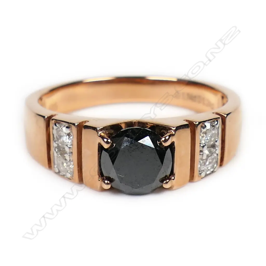 A 14ct rose gold black and white diamond ring, Image 1++
