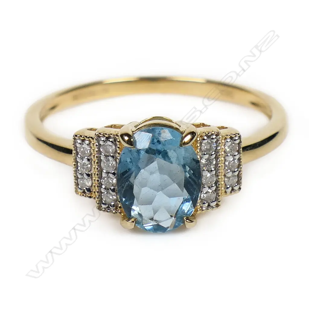 A 14ct gold aquamarine and diamond dress ring, Image 1++