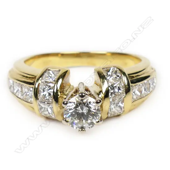 An 18ct yellow gold and white gold diamond set ring,