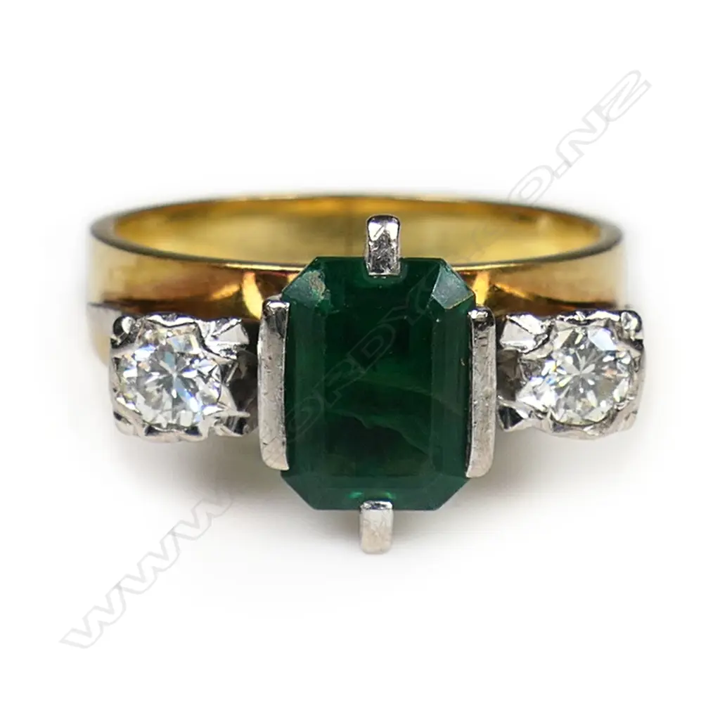 An 18ct yellow and white gold synthetic emerald and diamond three stone ring, Image 1++