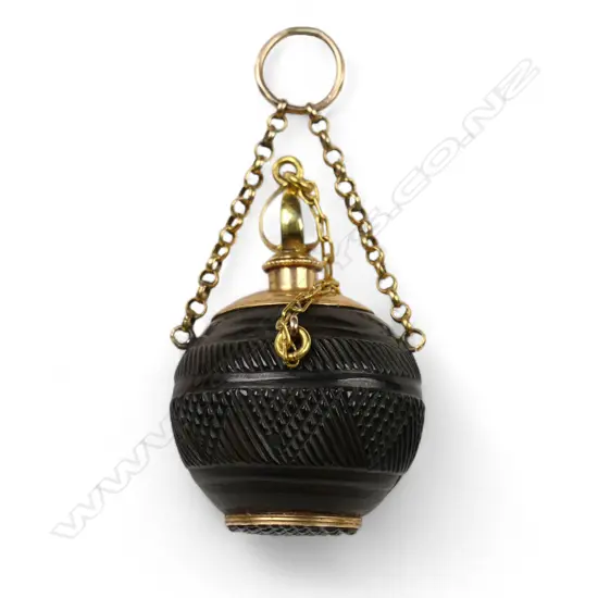 An early 1900s 9ct gold and bog oak pendant,