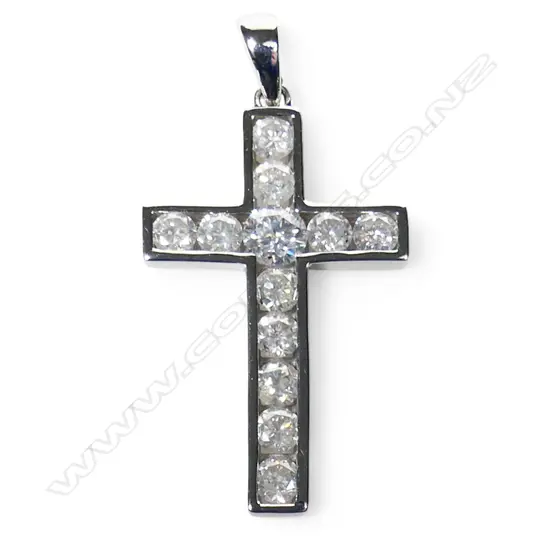A 14ct white gold and diamond set crucifix pendant,