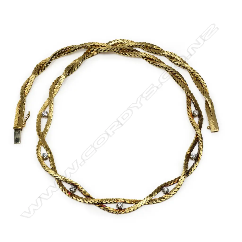 An 18ct gold diamond set chain necklace, Image 1++