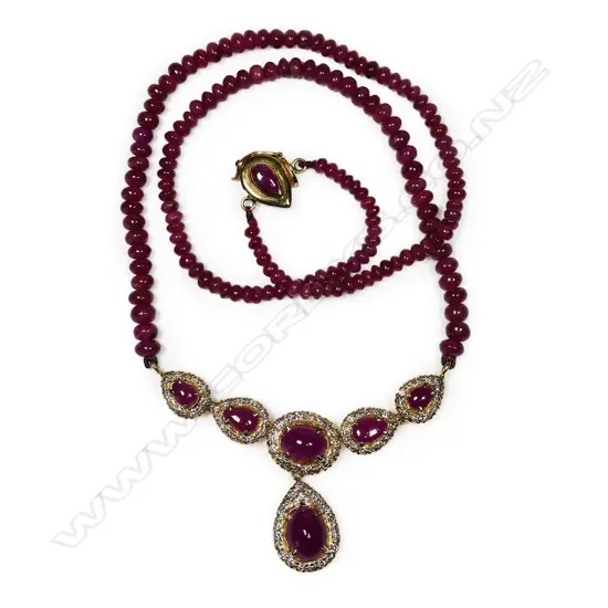 An 18ct gold ruby and diamond necklace,