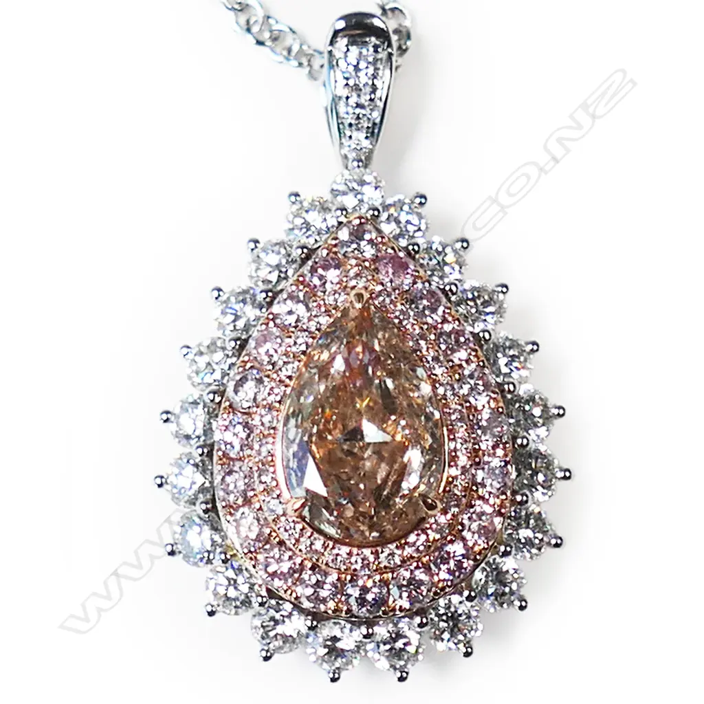 An 18ct white gold and pink diamond ring/pendant, Image 1++