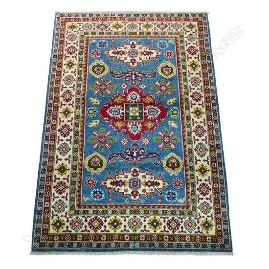 A handknotted Kazak rug,