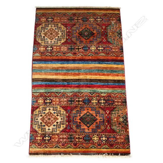 A handknotted Khurjeen rug,