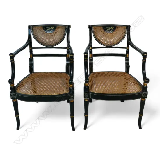 A pair of Regency style quality ebonised armchairs,