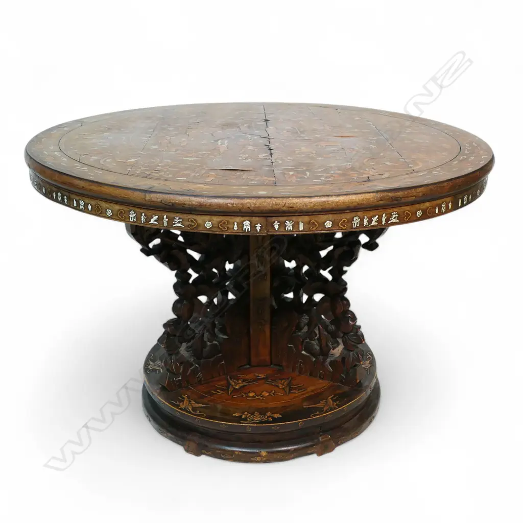 An impressive antique Chinese dining table the round top inlaid with multiple courtyard scenes, bamboo, willow trees, clouds, phoenix birds, etc, Image 1++