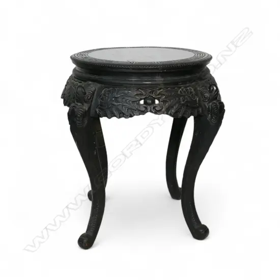 A c.1900 Anglo-Japanese ebonised and carved side table,